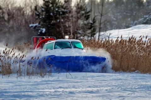 hovercraft moves through the snow